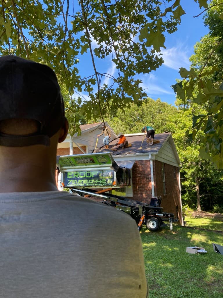 eRoof crew installing shingles